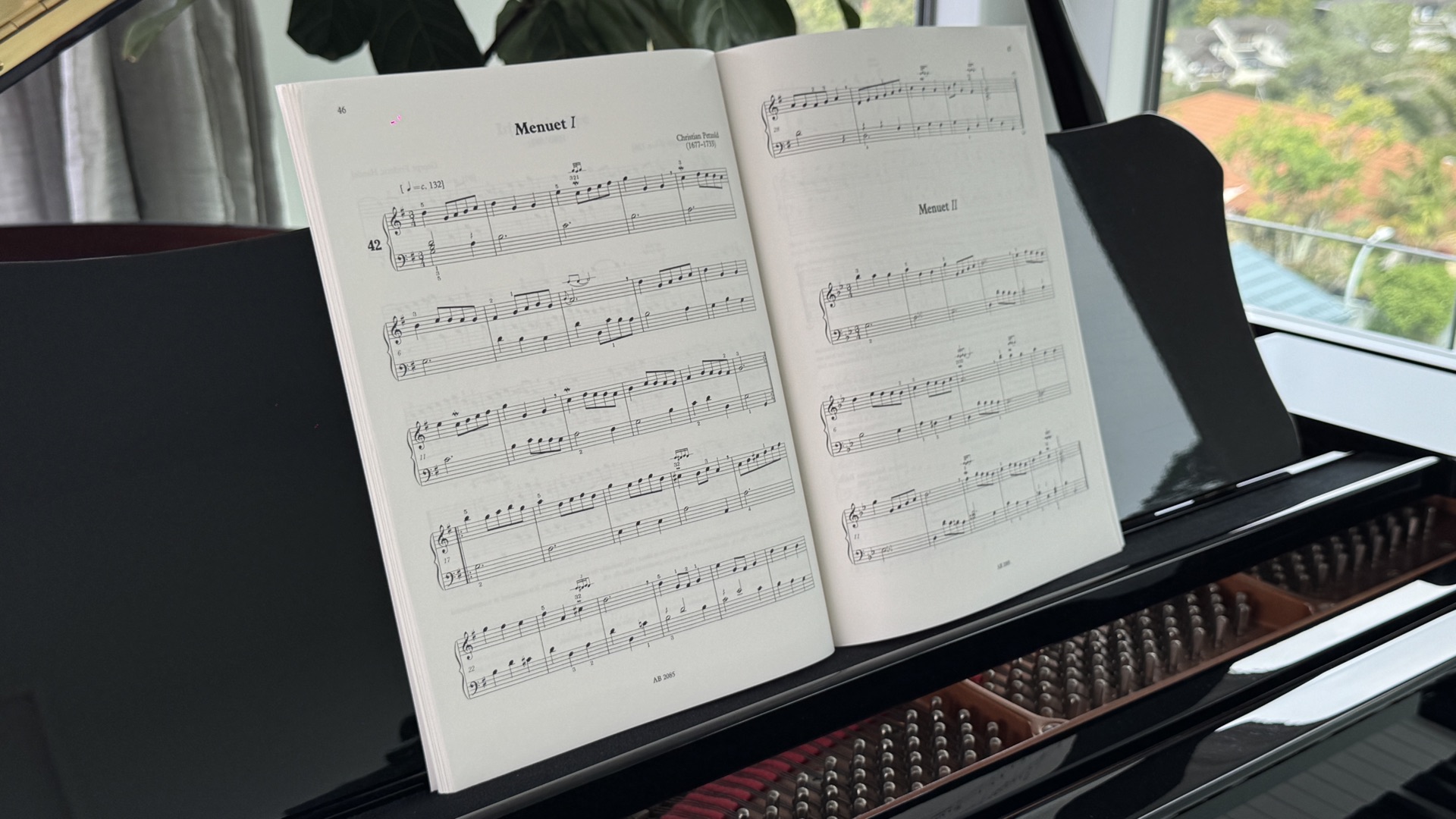 Piano student studying harmony and chords at the intermediate level